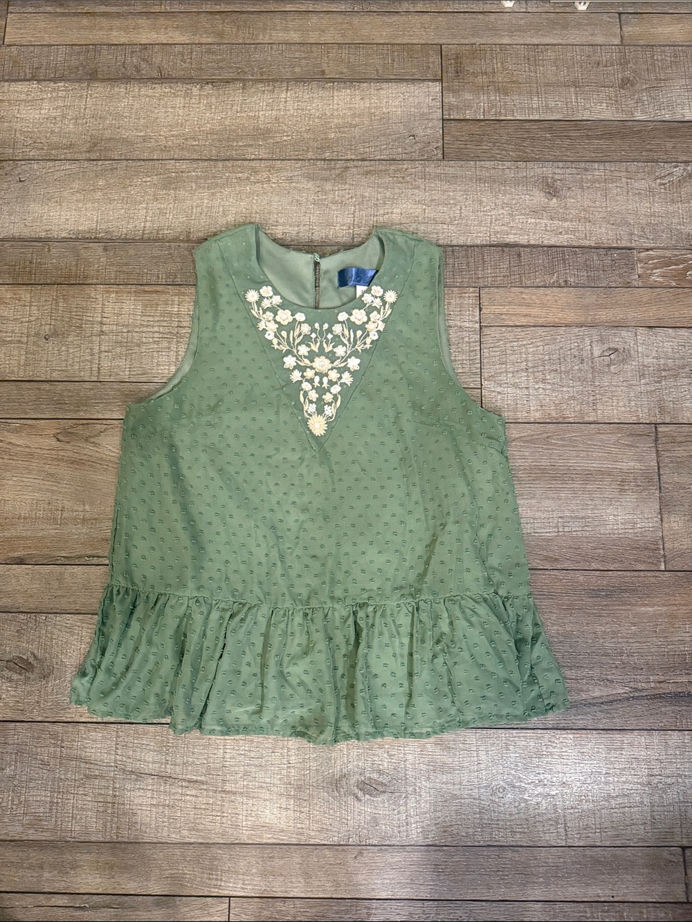 Green Sleeveless Peplum Top with White Floral Embroidery